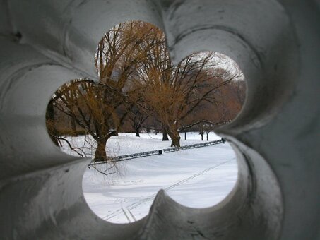 View through railing of Bow Bridge